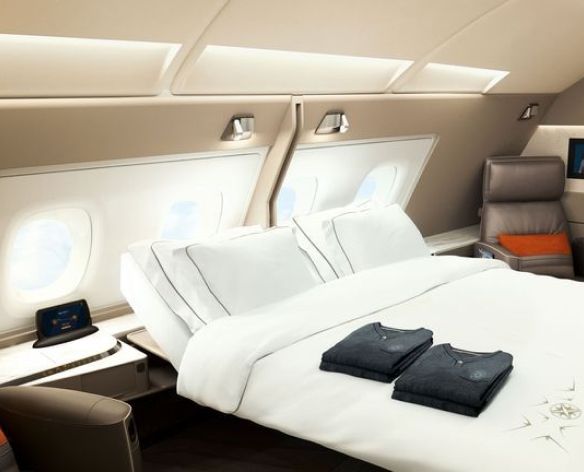 A private jet and a champagne glass on the tarmac